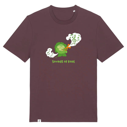 Rotbraunes Unisex T-Shirt mit Rundhalsausschnitt. Auf der Brust ist ein Kohl der Musik auf einer Trompete spielt. Darunter steht der Spruch Sounds of Kohl.
